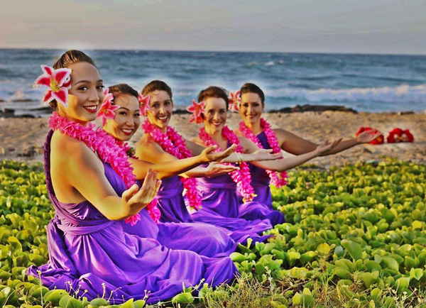 Genuine Hawaiian entertainment performers wearing beautiful purple costumes | Altus Entertainment