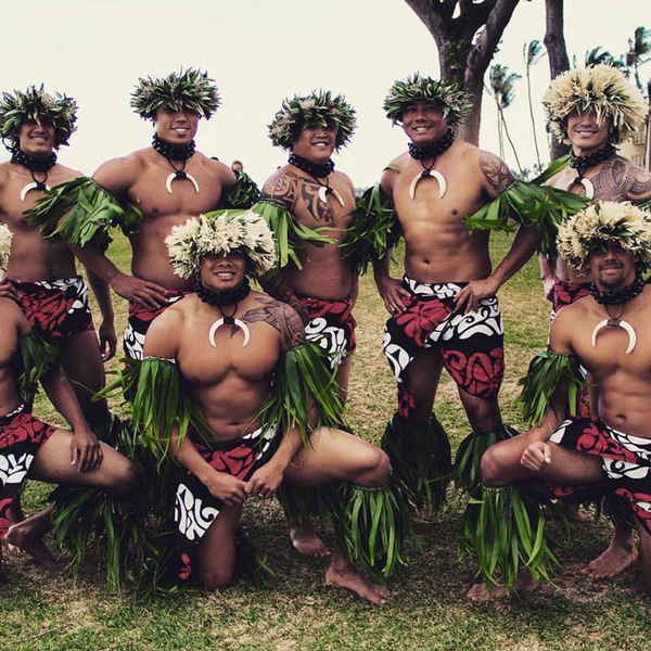 Genuine Hawaiian entertainment performers posing in costume before a performance at an event | Altus Entertainment