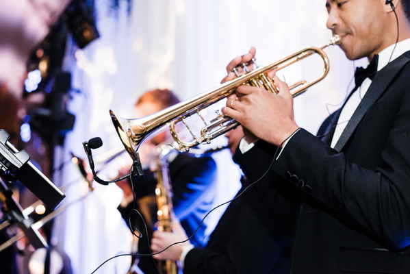 Versatile cover band South Carolina performing onstage at a wedding reception | Altus Entertainment