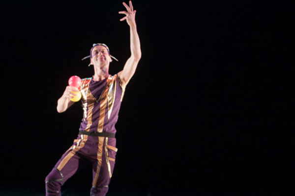 Contact juggling for events performer doing his act onstage at an event | Altus Entertainment