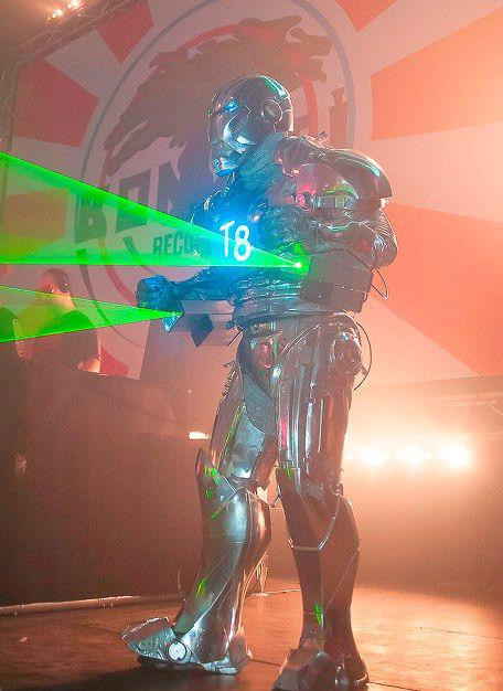 Robot performer for robot laser show in Malta pointing lasers to audience while standing onstage | Altus Entertainment