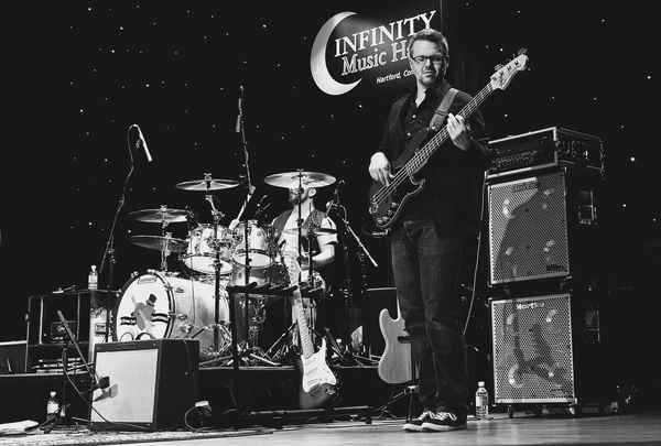 Image may contain person playing a musical instrument on stage. | Altus Entertainment