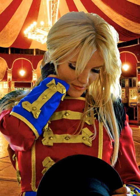 Britney Spears impersonator for events wearing circus costume while looking to ground inside circus tent | Altus Entertainment